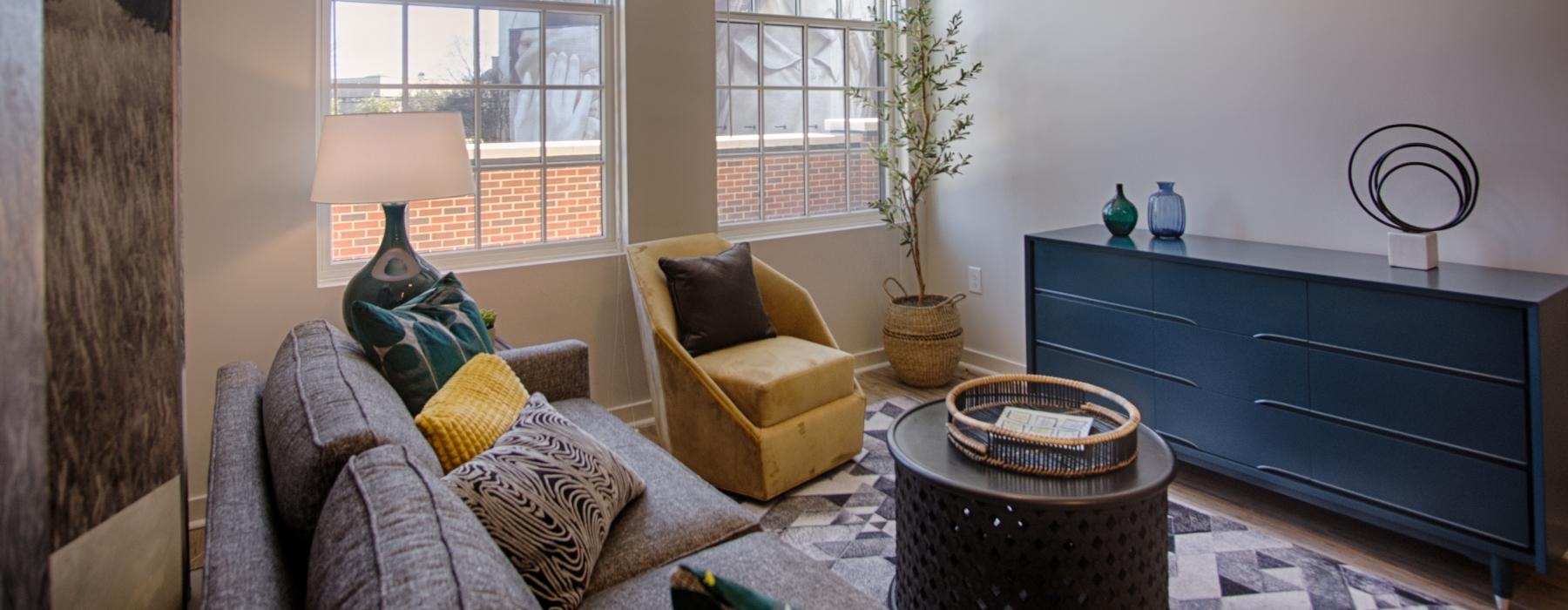 a living room with a couch and a table
